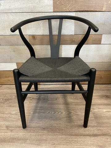 Black wooden and weaved wicker chair